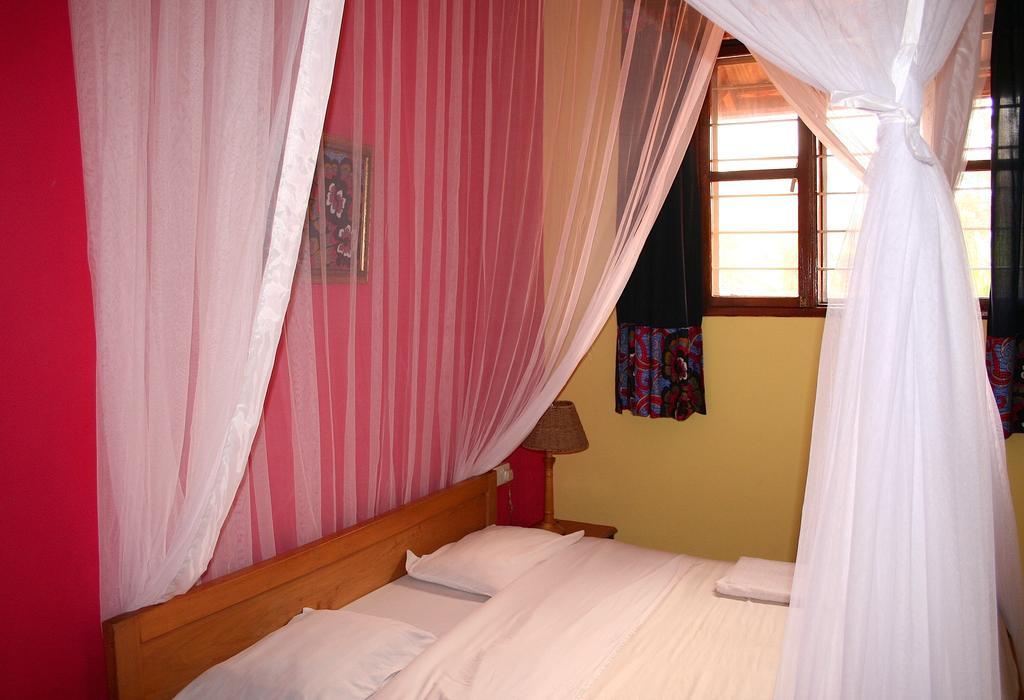 Hotel Acacia Kampala Quarto foto